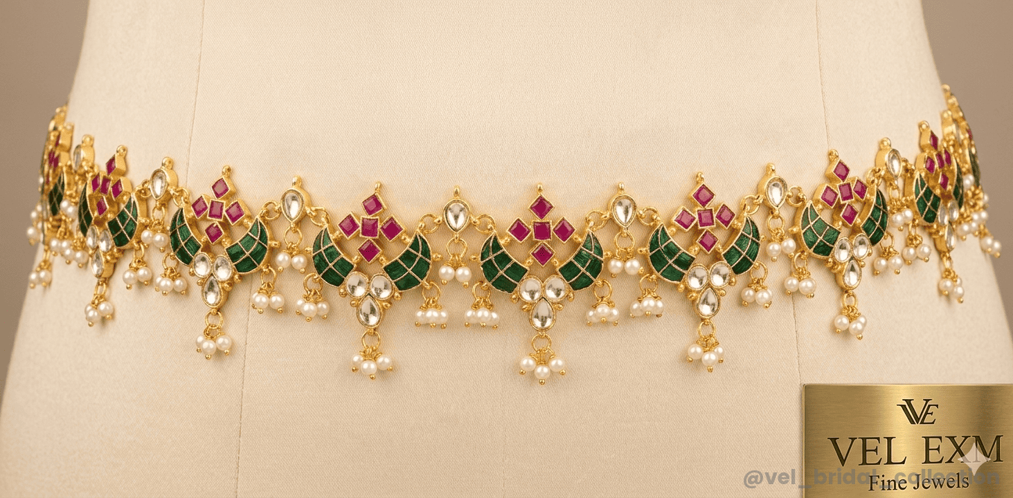Jadau Kundan bridal set and peacock theme with ruby-red and emerald-green stones.
